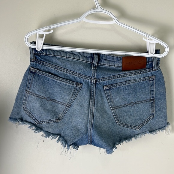 Lucky Brand Cut Off Distressed Rip Fly Denim Shorts Size 2 - Picture 4 of 10
